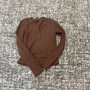 Brown skims top